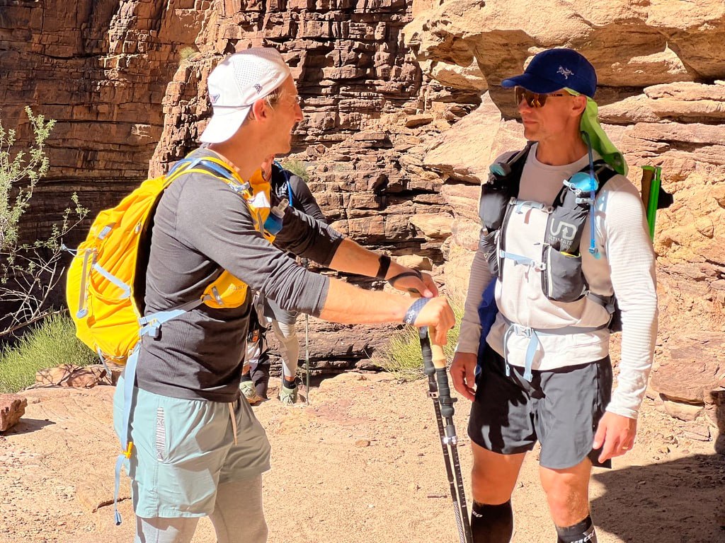 Austin talking with a hiker on the trail