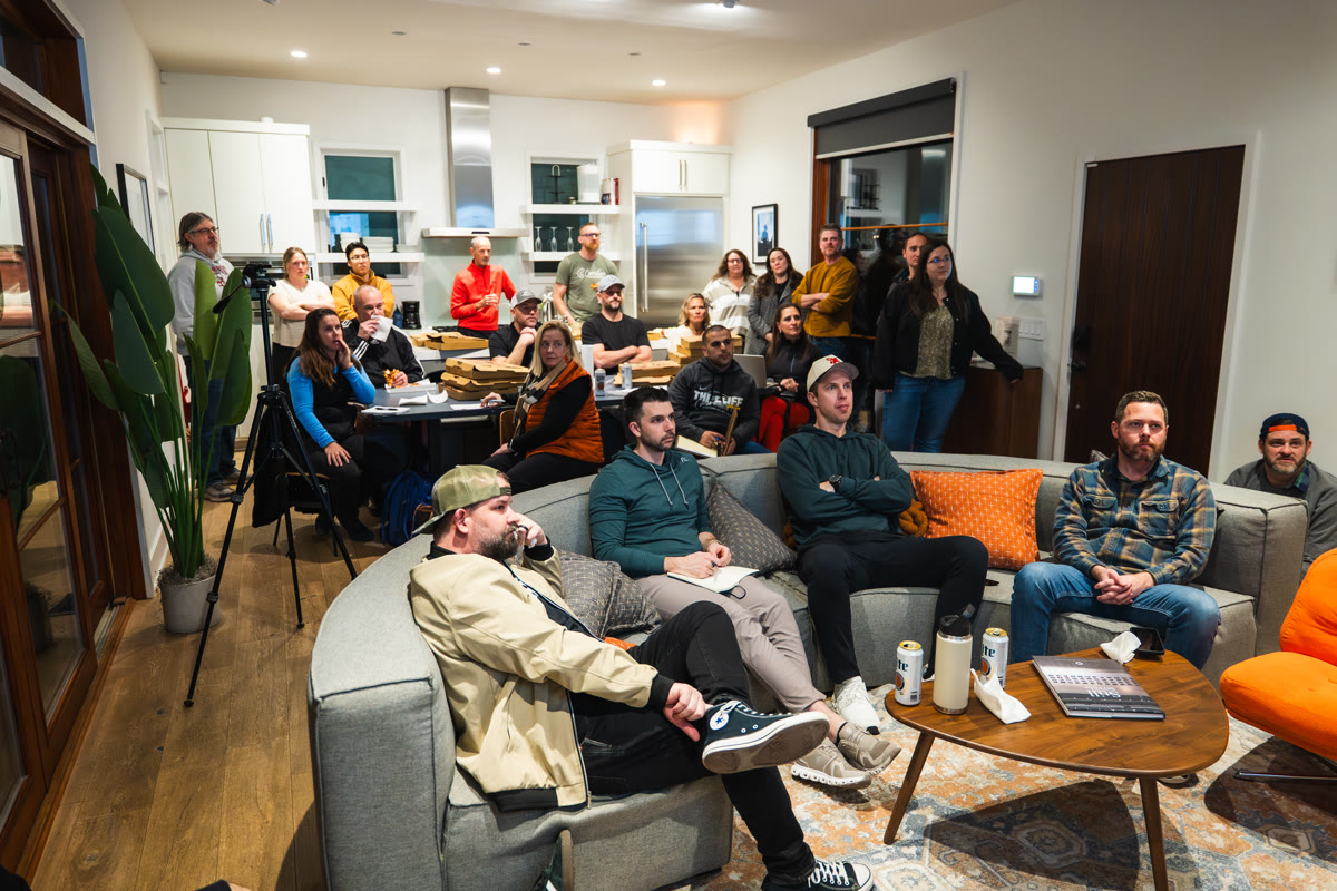 25+ people in a living room for a casual watch party