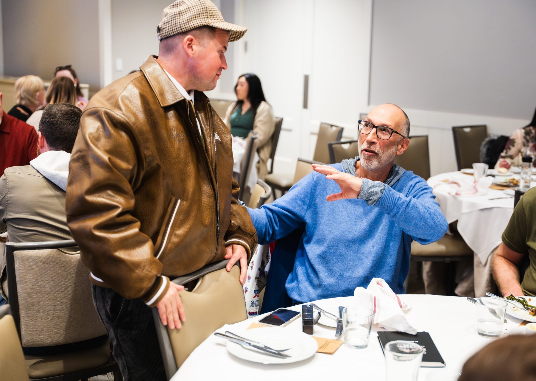Growth Summit attendees in conversation during a session